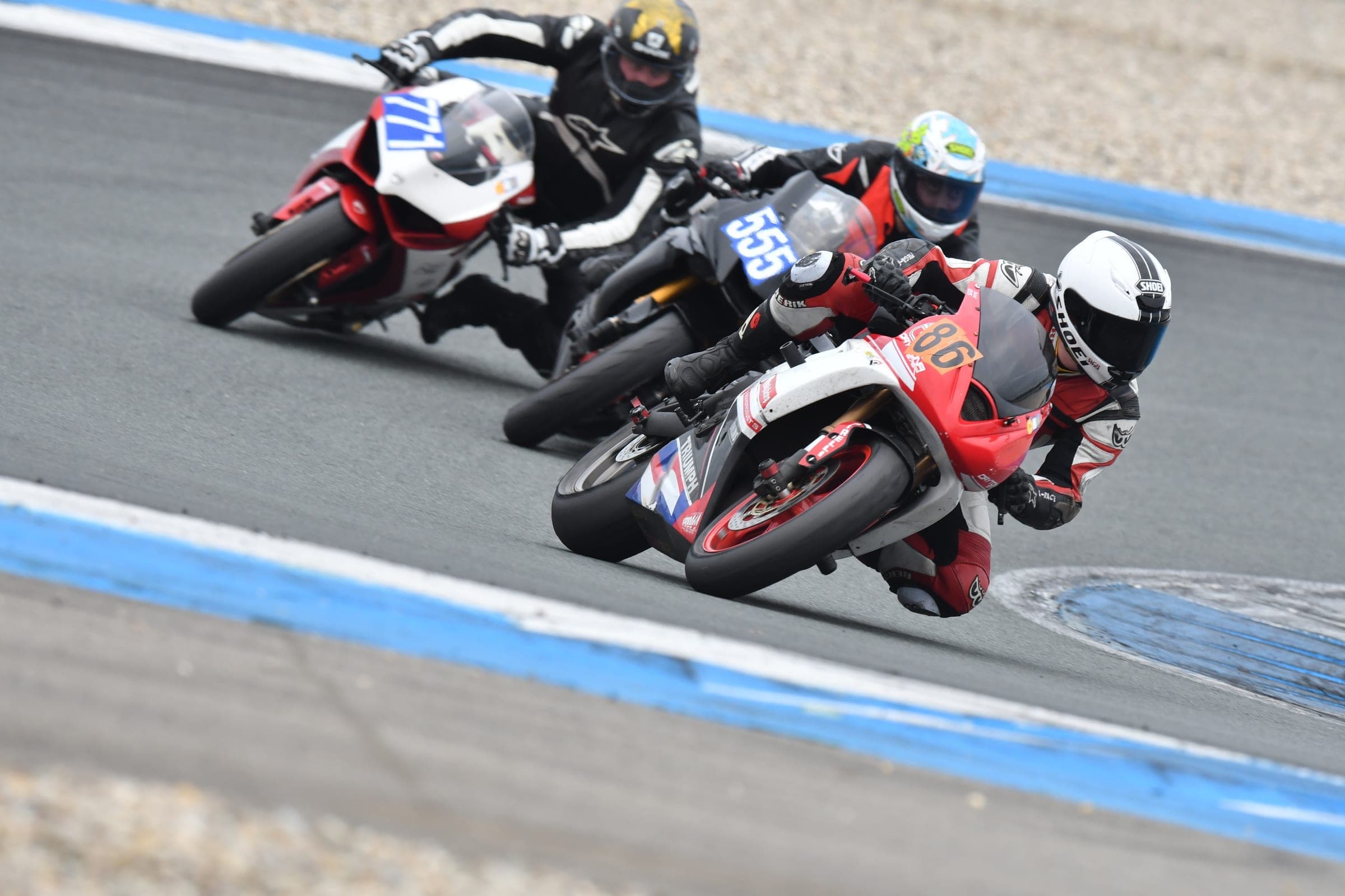 Motorcycle cornering at speed on a race circuit